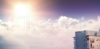 Composite image of tranquil scene of bright sun over cloudscape