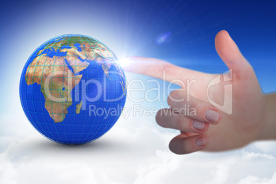 Composite image of cropped hand of woman pointing