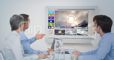 Composite image of attentive business team during a conference