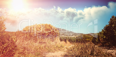 Composite image of view of overcast against blue sky