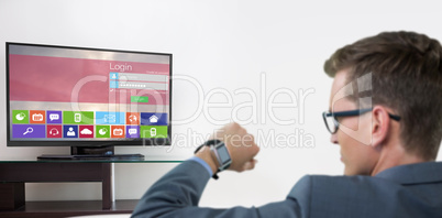 Composite image of rear view of businessman checking his smart watch