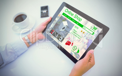 Composite image of man using tablet pc