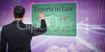 Composite image of asian businessman pointing