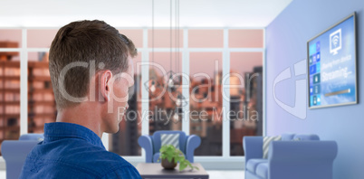 Composite image of man touching invisible screen
