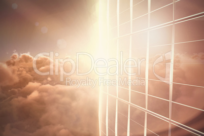 Composite image of glass building on sunny day