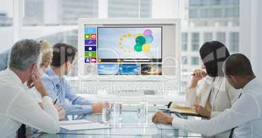 Composite image of business people looking at blank whiteboard in conference room