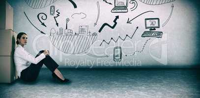 Composite image of businesswoman leaning on cardboard boxes against white background