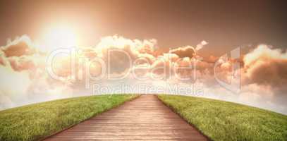 Composite image of scenic view of bright sun over clouds