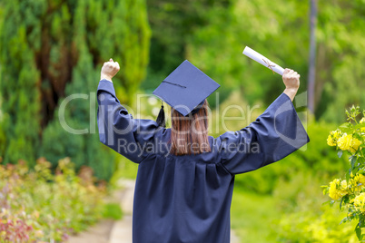 Young woman celebrating the graduation day