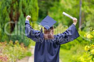 Young woman celebrating the graduation day