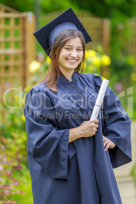 Graduated young woman smiling at camera