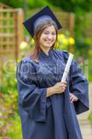 Graduated young woman smiling at camera