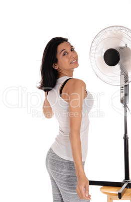 Woman cooling up on fan.