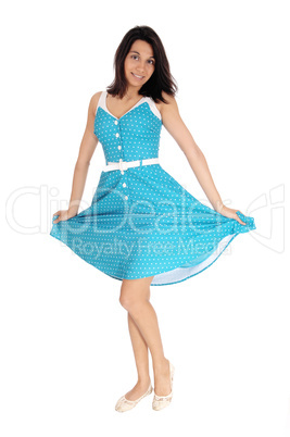 Beautiful Hispanic woman in blue dress.