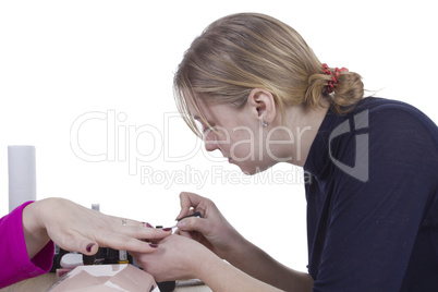 Young woman - master of manicure