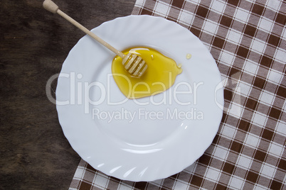 White plate with honey