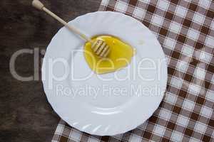 White plate with honey