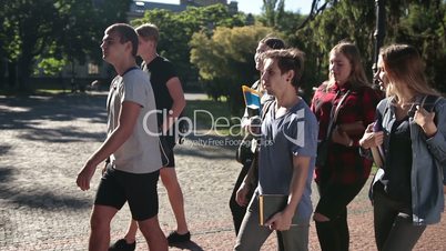 Group of students going to lecture in university