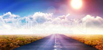 Composite image of idyllic view of bright sun over clouds during sunny day