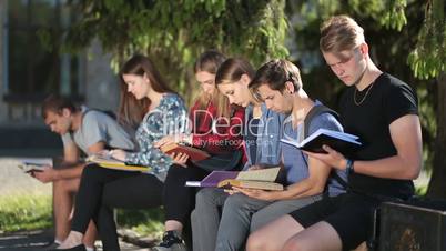 Group of college students studying together