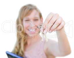 Excited Woman Holding House Keys Isolated on a White Background.