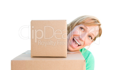 Happy Young Adult Woman Holding Moving Boxes Isolated On A White