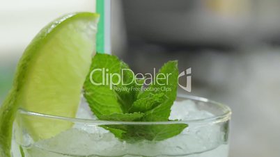 Glass Of Mojito Cocktail With Fresh Mint And Lime