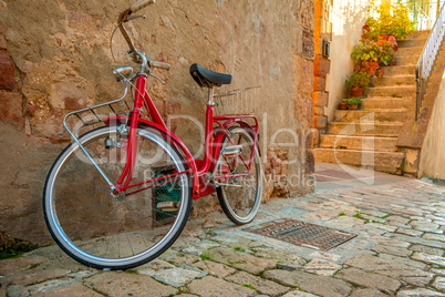 Red Bicycle on the Narrow Street of the Old City