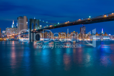 Brooklyn Bridge and Night Embankment of Manhattan