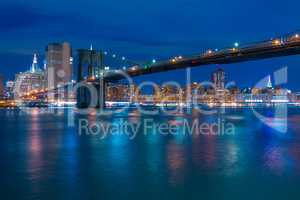 Brooklyn Bridge and Night Embankment of Manhattan