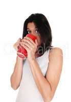 Beautiful Hispanic woman with red mug.