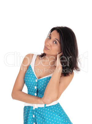 Beautiful Hispanic woman in blue dress.