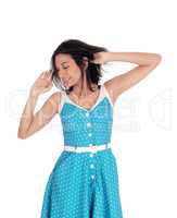 Beautiful Hispanic woman in blue dress.