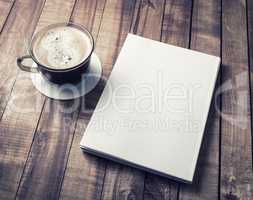 Book and coffee cup