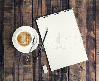Notepad and coffee cup