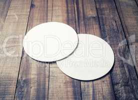 Two blank coasters
