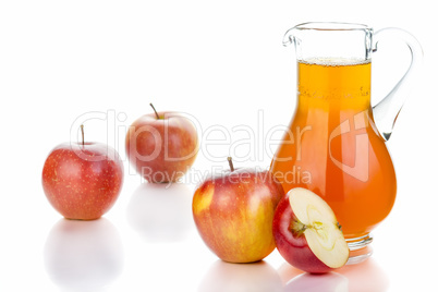 Fresh apples, glass with juice on white background