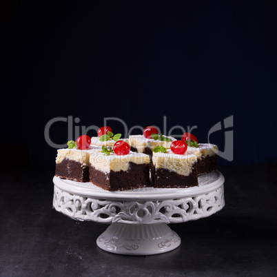 chocolate cream cake with cherries