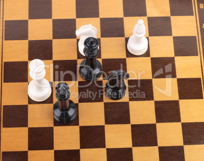 wooden checkerboard with figures