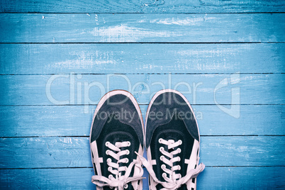 pair of blue male shoes