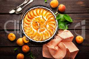 Apricot cake or pie with fresh fruits, cheesecake