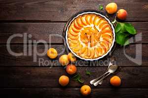 Apricot cake or pie with fresh fruits, cheesecake