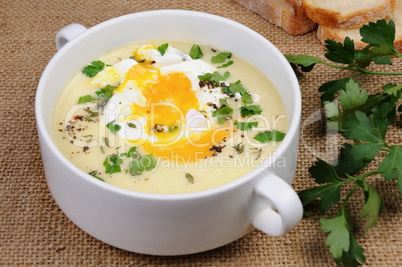 potato cream soup with poached eggs