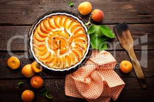 Apricot cake or pie with fresh fruits, cheesecake