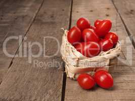 Organic grape tomatoes in a basket