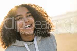 Mixed Race African American Girl Teenager Smiling on Beach at Su