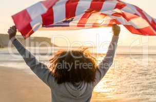 Mixed Race African American Girl Teenager With US Flag Beach at