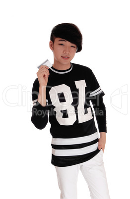 Young man holding a credit card.