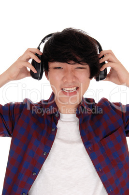 Asian man listen to music.