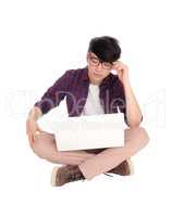 Young Asian teen with laptop.